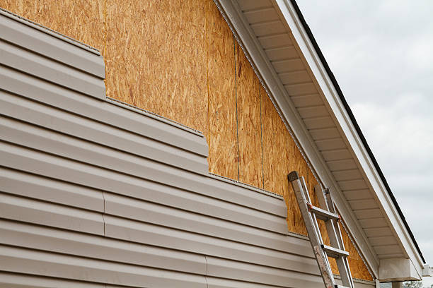 Professional Emergency Siding Repair technician working in Milton, NY